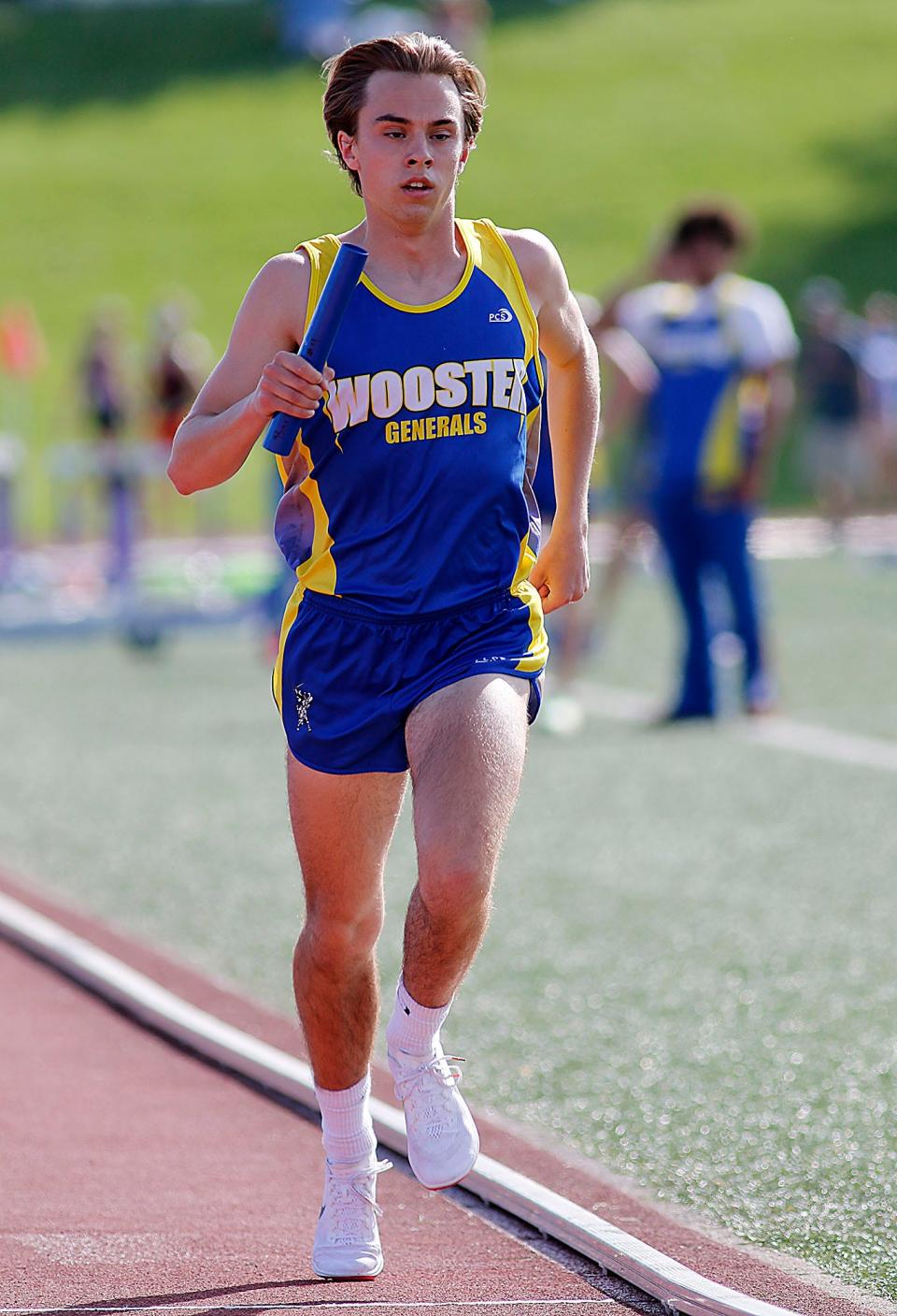Wooster High School's Ashton Dunlap competes in the 4x800 meter relay at the Ohio Cardinal Conference track meet held at Ashland University on Friday, May 13, 2022. TOM E. PUSKAR/TIMES-GAZETTE.COM