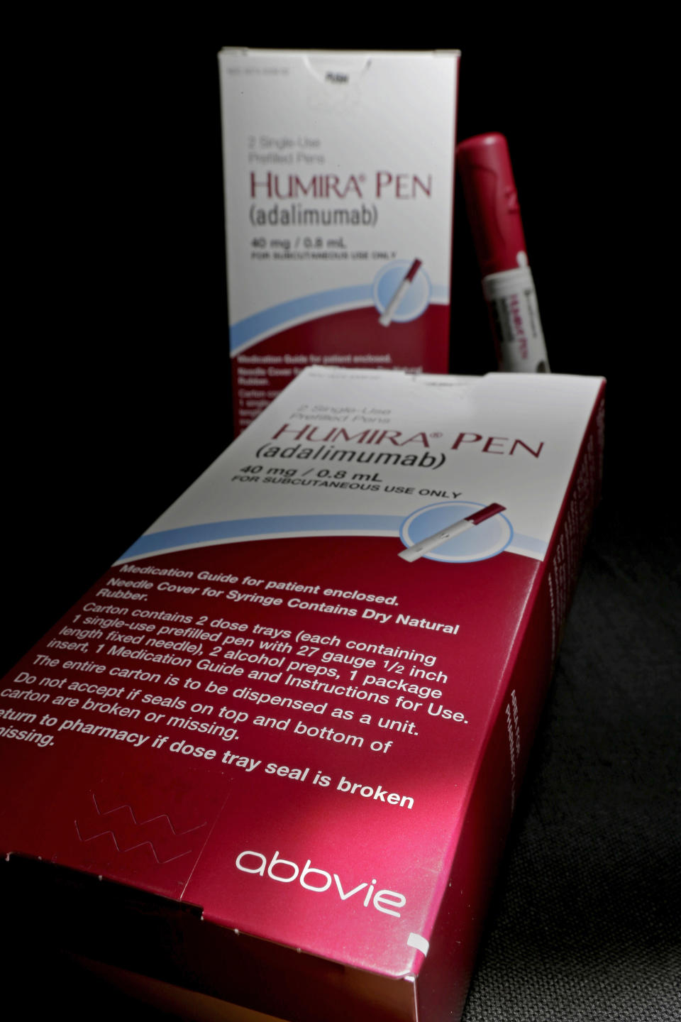 FILE - This July 18, 2014, file photo shows AbbVie's signature drug Humira, in Houston. California has filed a lawsuit accusing pharmaceutical giant AbbVie of illegally plying doctors with cash, gifts and services to prescribe Humira, one of the world's biggest selling drugs. The suit filed on Tuesday, Sept. 18, 2018, says the kickbacks led doctors to write unneeded prescriptions for Humira despite its potentially deadly side effects. (AP Photo/David J. Phillip, File)