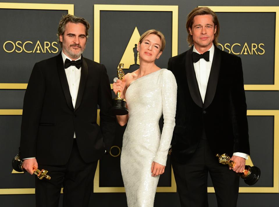 From left, Joaquin Phoenix, Renee Zellweger and Brad Pitt on Feb. 9, 2020.