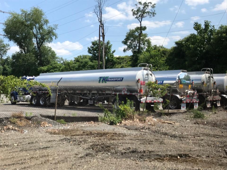 TK Transport fuel tankers are parked in the rear yard of its Pennsauken terminal. The truckling firm  lost one of its drivers and a fuel tanker when it exploded Sunday while exiting I-95 in Northeast Philadelphia.