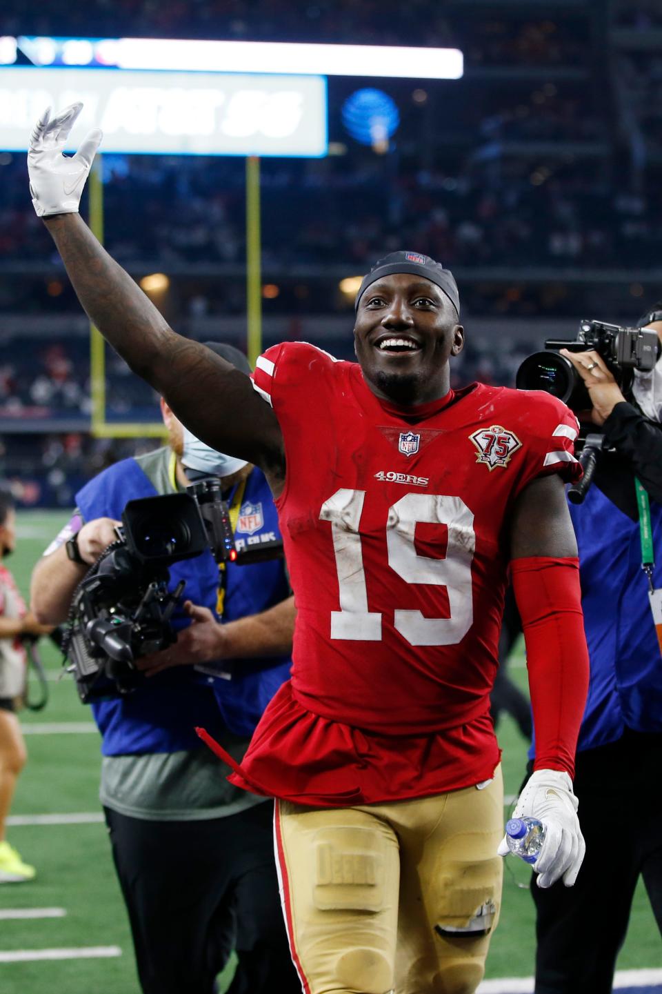 San Francisco 49ers wide receiver Deebo Samuel leaves the field in celebration after the game against the Dallas Cowboys.