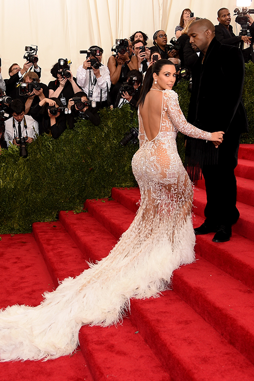 Kim on the arm of her husband, Kanye, at the 2015 Met Gala.