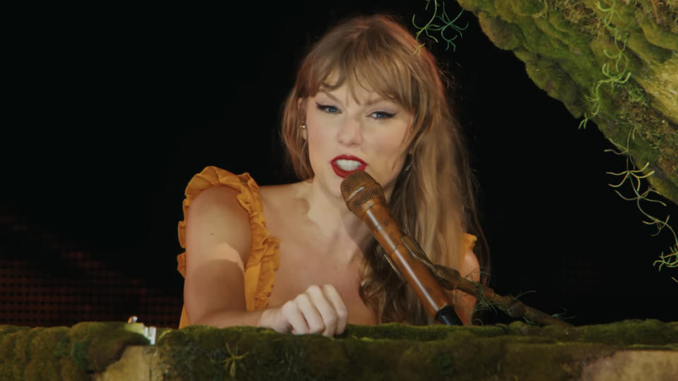 Taylor Swift on piano in The Eras Tour film