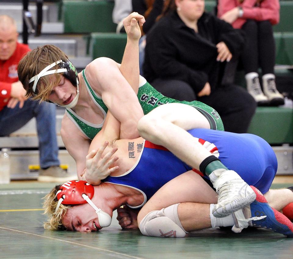 Smithville's Michael Harris defeats West Holmes' Conner Varnes 13-2 in the 144-pound title match.