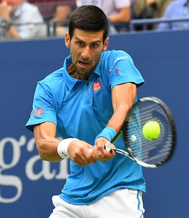 Sept 11, 2016; New York, NY, USA; Novak Djokovic of Serbia hits to Stan Wawrinka of Switzerland in the men's singles final on day fourteen of the 2016 U.S. Open tennis tournament at USTA Billie Jean King National Tennis Center. Mandatory Credit: Robert Deutsch-USA TODAY Sports