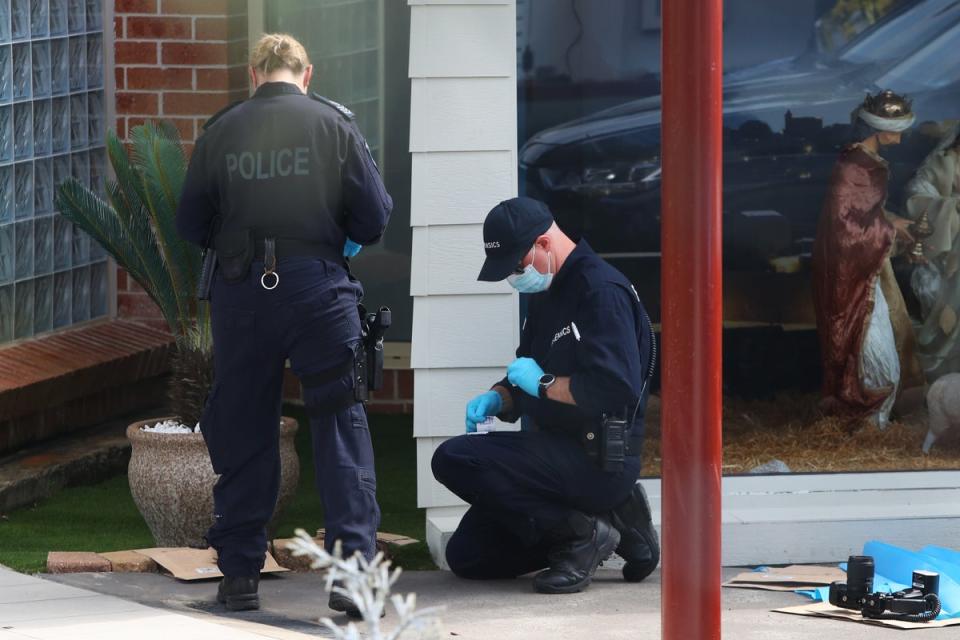 Forensic officers at the church in the Sydney suburb earlier this week (Getty)