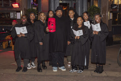 Big Narstie and the Melodees from Heaven Choir lead a festive carol performance at the Cat and Mutton with the FireKeg from Fireball - Photo Credit KG Media (PRNewsfoto/Fireball)