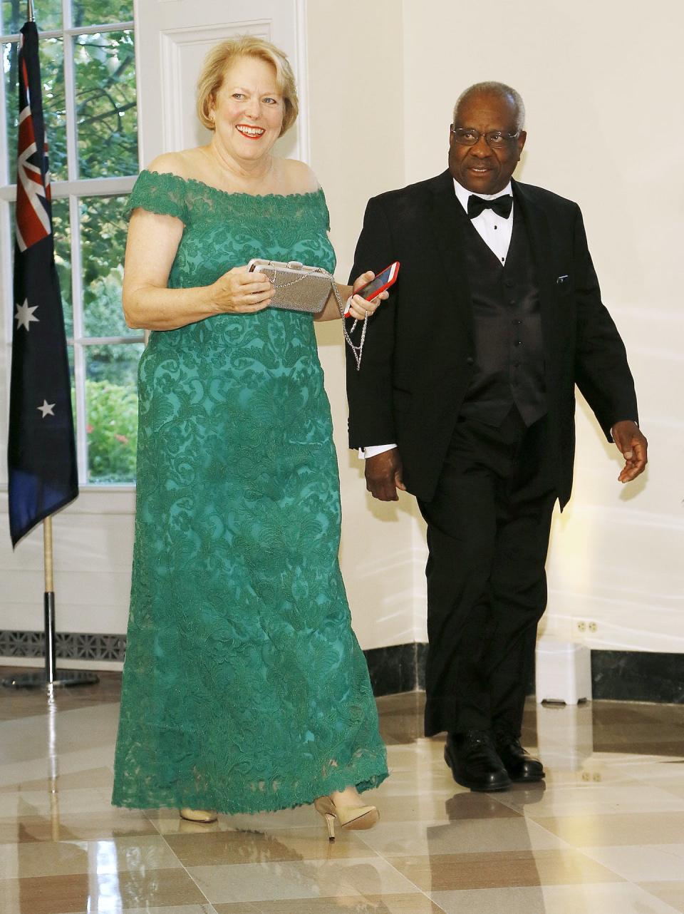 Supreme Court Justice Clarence Thomas and Virginia Thomas arrive at White House dinner in 2019. <a href="https://www.gettyimages.com/detail/news-photo/supreme-court-justice-clarence-thomas-and-virginia-thomas-news-photo/1176041042?adppopup=true" rel="nofollow noopener" target="_blank" data-ylk="slk:Paul Morigi/Getty Images;elm:context_link;itc:0;sec:content-canvas" class="link ">Paul Morigi/Getty Images</a>