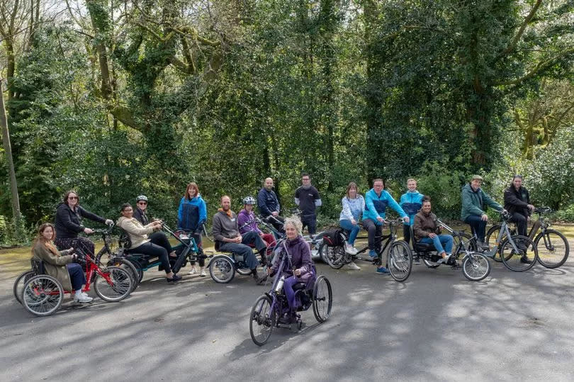 Some participants try out the adapted cycles in Hyde Park, Tameside, as the Cycling UK scheme launches -Credit:iD8 Photography