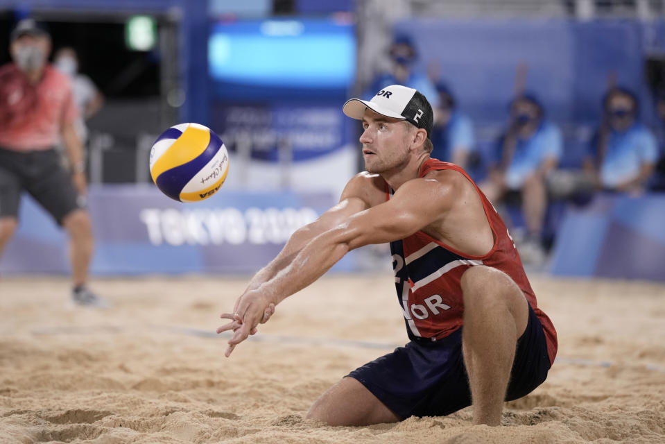 Christian Sandlie Sorum, of Norway, returns a shot during a men's beach volleyball semifinal match against Latvia at the 2020 Summer Olympics, Thursday, Aug. 5, 2021, in Tokyo, Japan. (AP Photo/Felipe Dana)