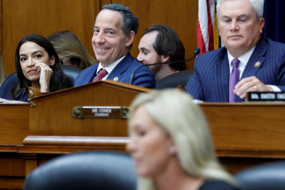 Marlyand congressman Jamie Raskin (centre) and Republican congressman James Comer (right) clashed multiple times during a House hearing on Wednesday (REUTERS)