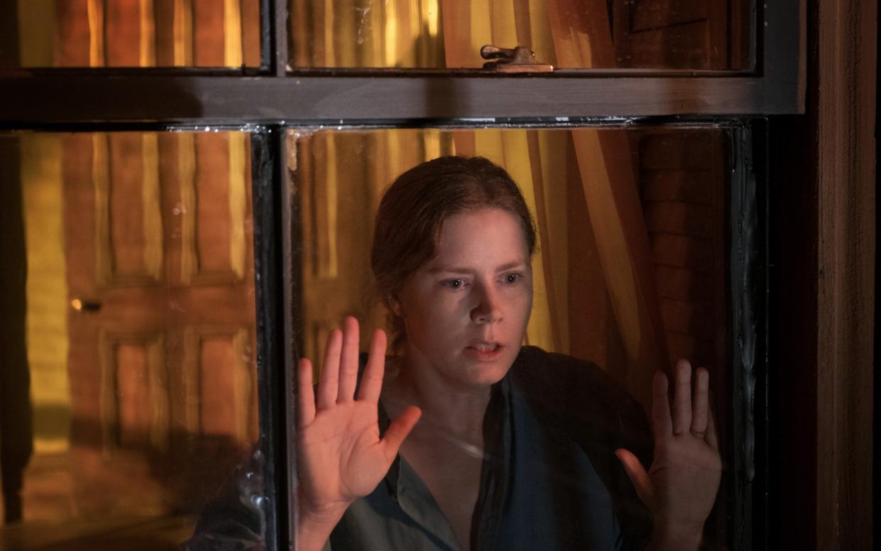 Amy Adams as the alcoholic Anna Fox in Netflix's dodgy Woman in the Window - Netflix