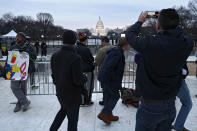 <p>People gather on the National Mall prior to Donald Trump’s Presidential Inauguration on January 20, 2017 in Washington, DC. (Photo: Patrick Smith/Getty Images) </p>