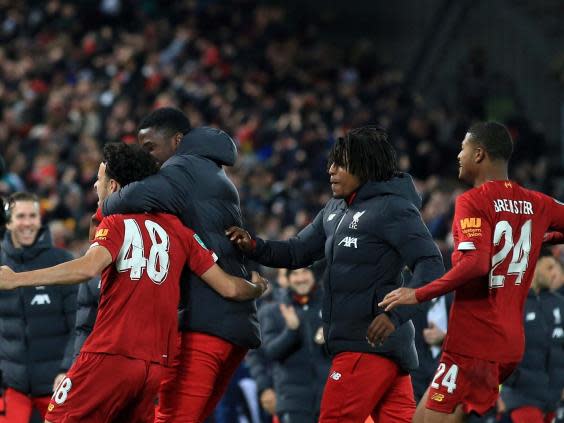 Liverpool celebrate their penalty shoot-out (AP)