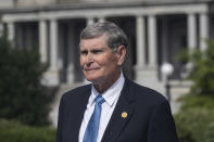 Jim Ryun pauses during a television interview before President Donald Trump presents him the Presidential Medal of Freedom, at the White House, Friday, July 24, 2020, in Washington. (AP Photo/Alex Brandon)