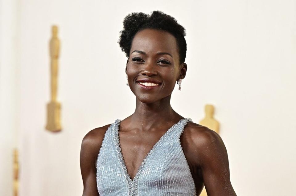 Lupita Nyong'o with body glitter (AFP via Getty Images)