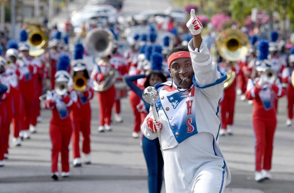 JASON VORHEES/THE TELEGRAPH Macon, GA, 03/24/2019: A drum major with the Southwest High Marching Patriots Band dances while the band performs along Mulberry Street during the 38th Cherry Blossom Festival Parade Sunday.