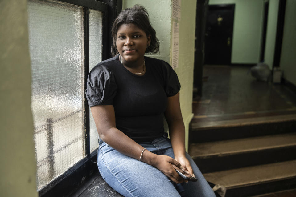 Mia Hall, 14, poses for a portrait in her neighborhood park on Thursday, Aug. 29, 2024, in Bronx borough of New York. (AP Photo/Brittainy Newman)