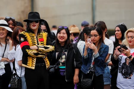 Fans gather at Forest Lawn Cemetery ten years after the death of child star turned King of Pop, Michael Jackson, in Glendale, California