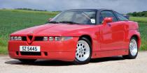 <p><a href="https://www.roadandtrack.com/car-culture/news/a28514/il-monstro-lives/" rel="nofollow noopener" target="_blank" data-ylk="slk:The Alfa Romeo SZ;elm:context_link;itc:0;sec:content-canvas" class="link ">The Alfa Romeo SZ</a> was nicknamed "The Monster" after its debut, and one look will tell you why. Just over 1000 were built, and like the Milano, it's powered by a sonorous V-6. </p>