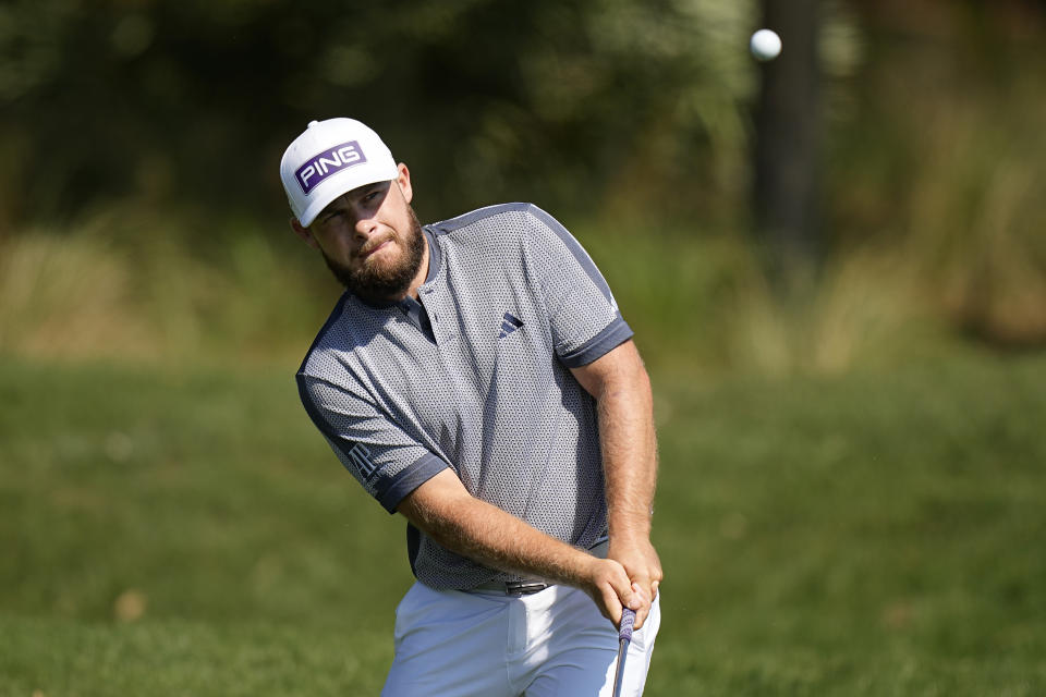 Tyrrell Hatton, of England, chips to the second green during the final round of The Players Championship golf tournament, Sunday, March 12, 2023, in Ponte Vedra Beach, Fla. (AP Photo/Eric Gay)