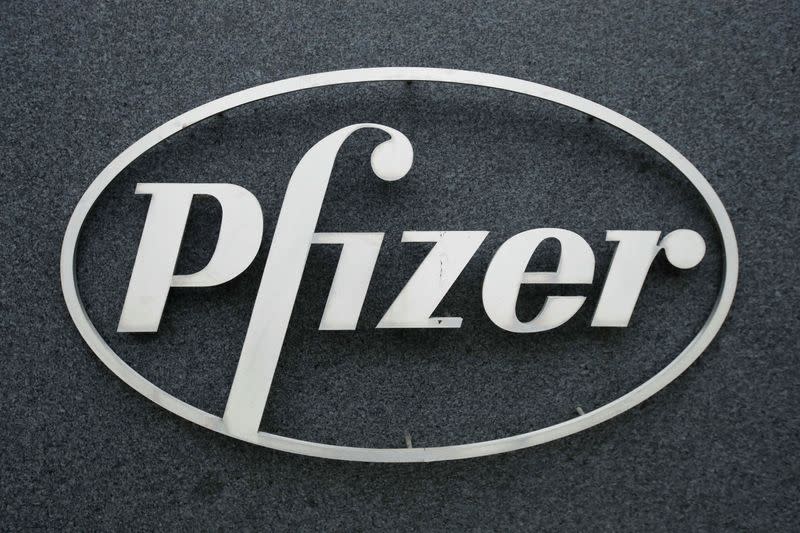 The Pfizer logo is seen at their UK commercial headquarters in Walton Oaks