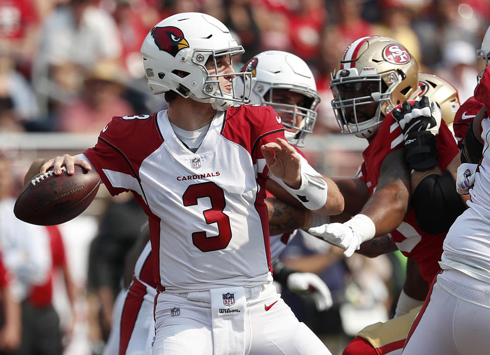 Arizona Cardinals quarterback Josh Rosen (3) looks to pass against the San Francisco 49ers during the first half of an NFL football game in Santa Clara, Calif., Sunday, Oct. 7, 2018. (AP Photo/Tony Avelar)