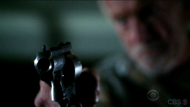 Chaz pulls a gun on Morgan in a tension filled scene during season 11, episode 18 of Criminal Minds.