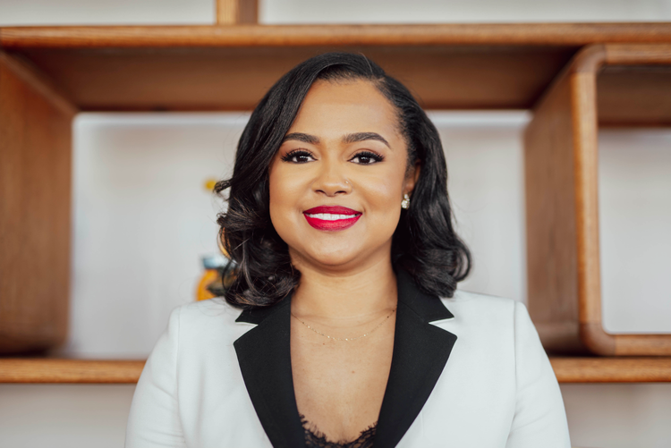 Sharhonda Bossier, CEO at Education Leaders of Color, had to wait tables to supplement her income when she was teaching. She worries that young people of color who enter teaching with continue to face a wealth gap.