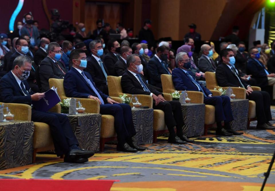 Prime Minister Tan Sri Muhyiddin Yassin (third from left) attends a Malaysia Prihatin event at the Putrajaya International Convention Centre March 1, 2020. — Bernama pic