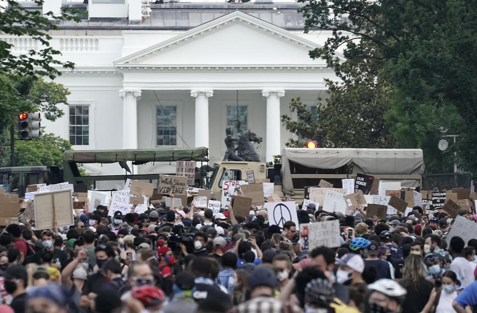 D.C. National Guard vehicles and protesters