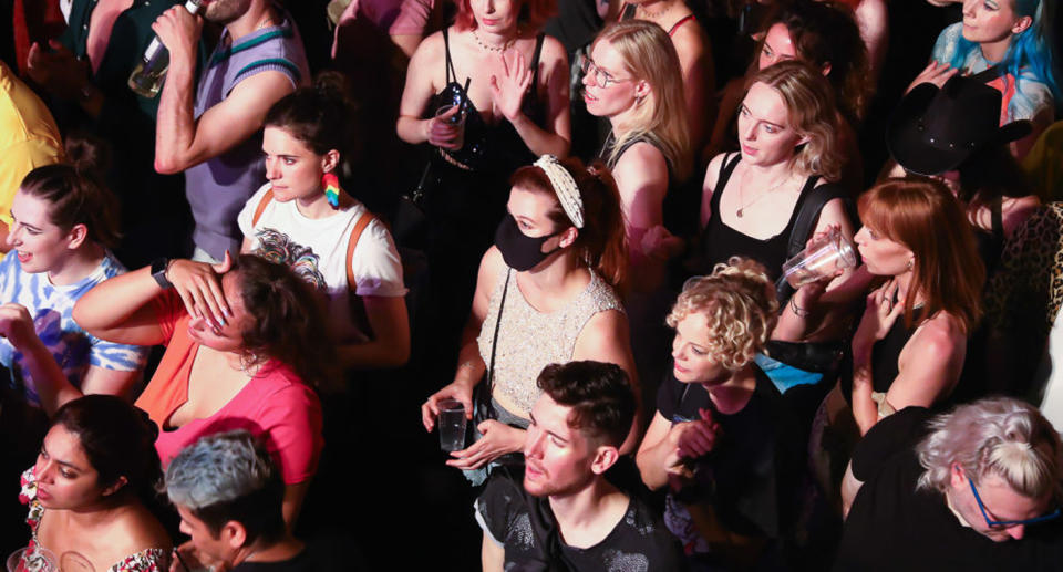 A group of women at a concert.