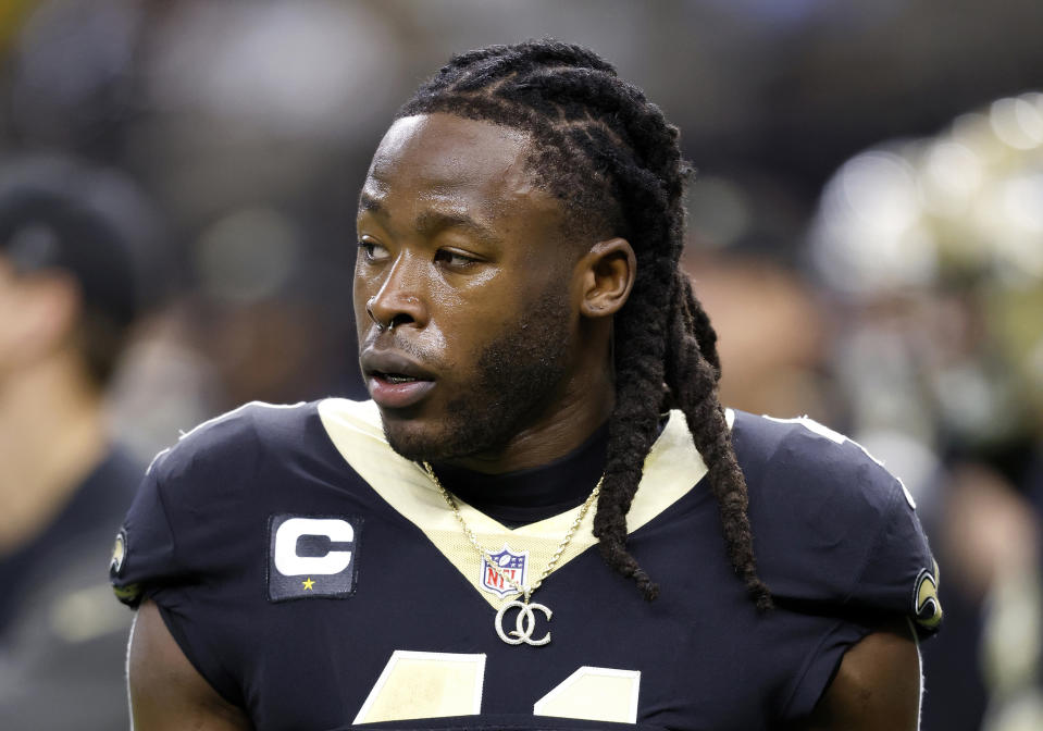 FILE - New Orleans Saints running back Alvin Kamara warms up for the team's NFL football game against the Las Vegas Raiders, Oct. 30, 2022, in New Orleans. Kamara, Cincinnati Bengals cornerback Chris Lammons and co-defendants Darrin Young and Percy Harris pleaded not guilty in state court in Nevada on Thursday March 2, 2023, to charges they beat a man unconscious at a Las Vegas Strip nightclub before the NFL’s 2022 Pro Bowl. (AP Photo/Tyler Kaufman, File)