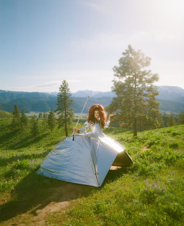 Pattie Gonia in a tent-turned-dress, slaying in the mountains. (Photo: Ethan Laarman-Hughes / The North Face)