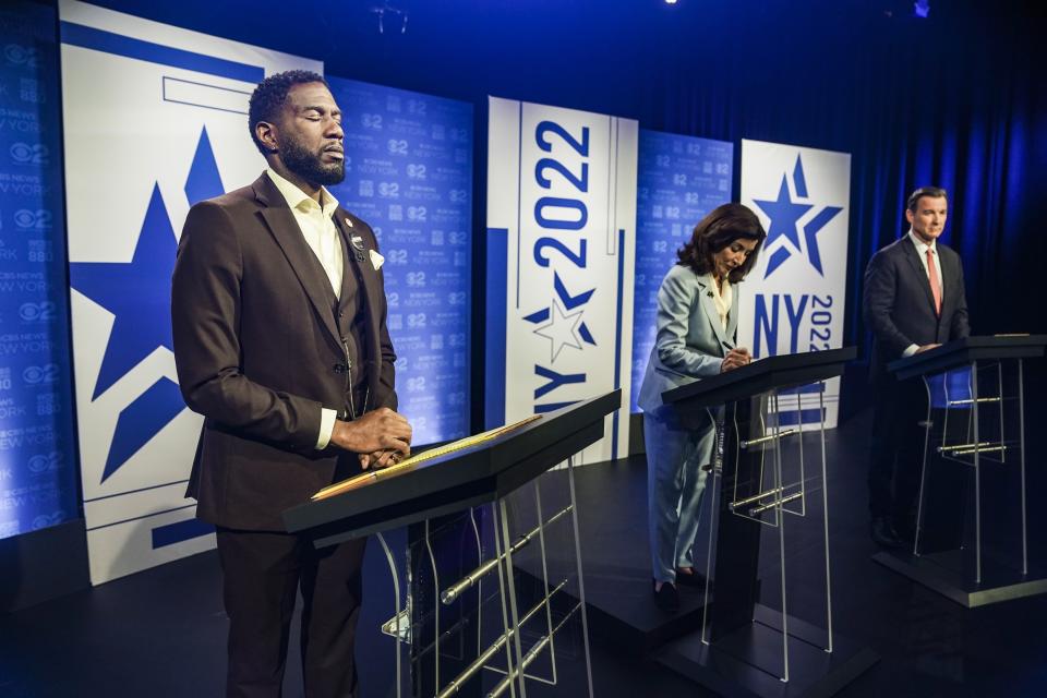 New York Public Advocate Jumaane Williams, left, New York Governor Kathy Hochul, center, Congressman Tom Suozzi, D-N.Y., prepare to face off during New York's governor primary debate at the studios of WCBS2-TV, Tuesday, June 7, 2022, in New York. (AP Photo/Bebeto Matthews)