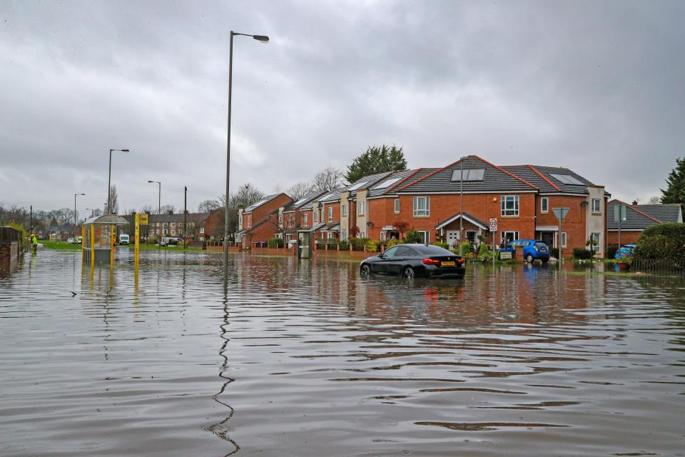 Flooded roads in West Derby, Liverpool (Peter Byrne/PA) (PA Archive)