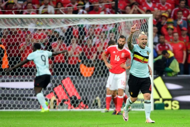 Belgium's midfielder Radja Nainggolan (R) celebrates scoring the opening goal during the Euro 2016 quarter-final between Wales and Belgium, on July 1, 2016