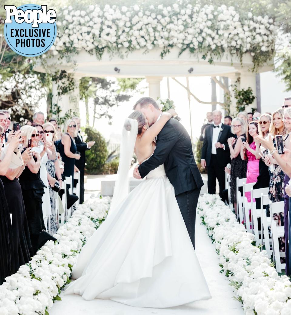 What is shown in the photograph - Victoria Garrick and Max Browne Where was the image taken - Waldorf Astoria Monarch Beach When was the image taken - August 13, 2022 Who took the photograph - Rebecca Yale Full credit line – Rebecca Yale Photography