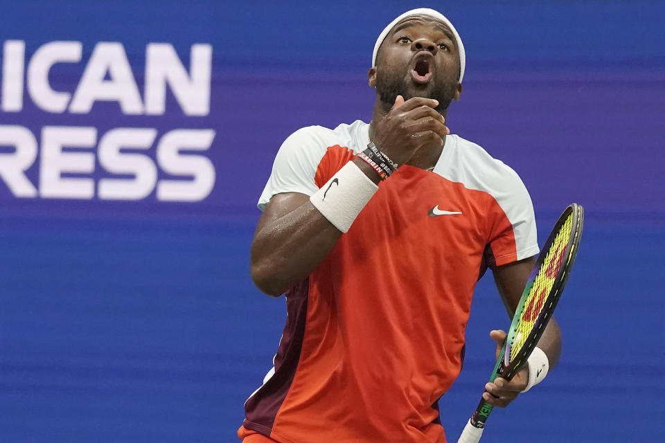 Frances Tiafoe, of the United States, reacts during a quarterfinal match against Andrey Rublev, of Russia, at the U.S. Open tennis championships, Wednesday, Sept. 7, 2022, in New York. (AP Photo/Mary Altaffer)