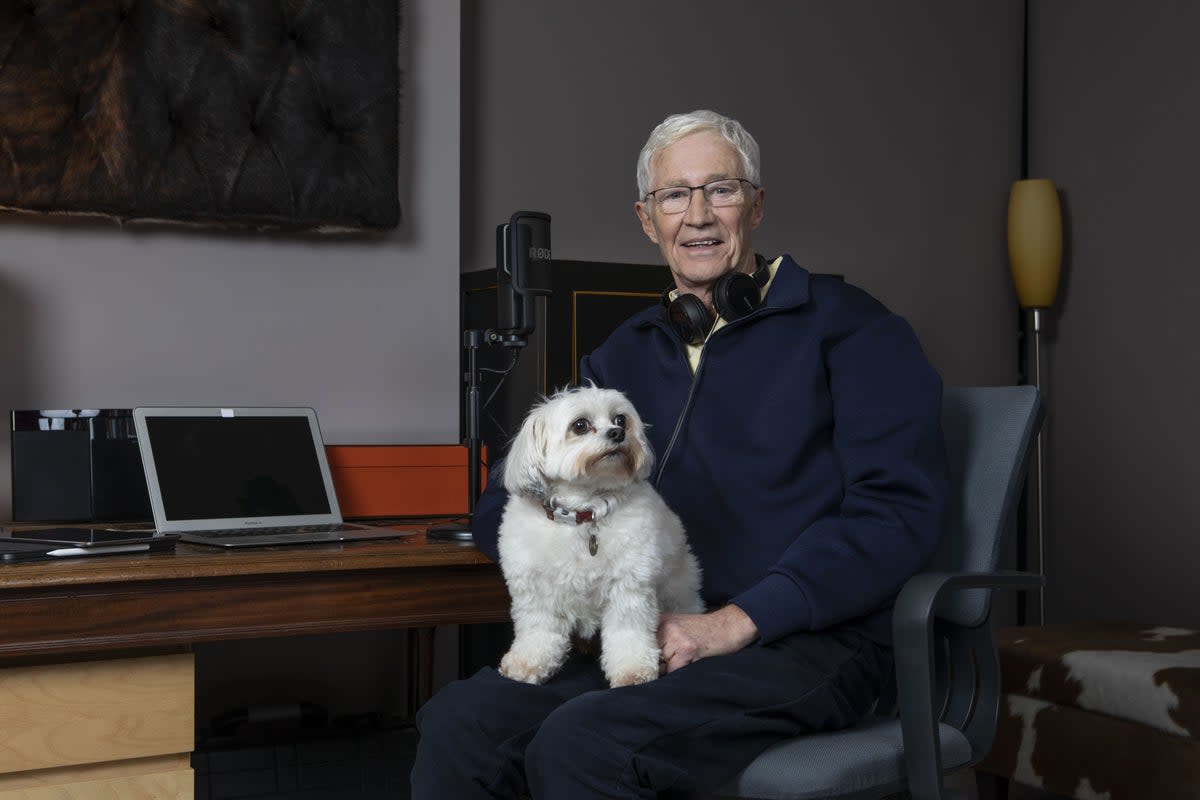 Paul O’Grady and his dog Conchita. O’Grady’s final ever radio show will be rebroadcast on Easter Sunday, in tribute to the late comedian and TV star (Boom Radio/PA) (PA Media)