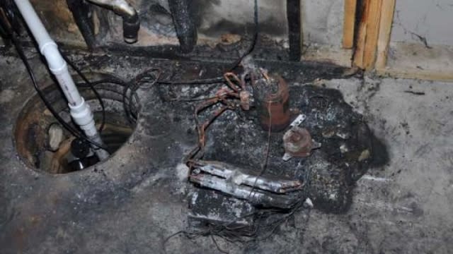 Damage from a burned dehumidifier in a home.