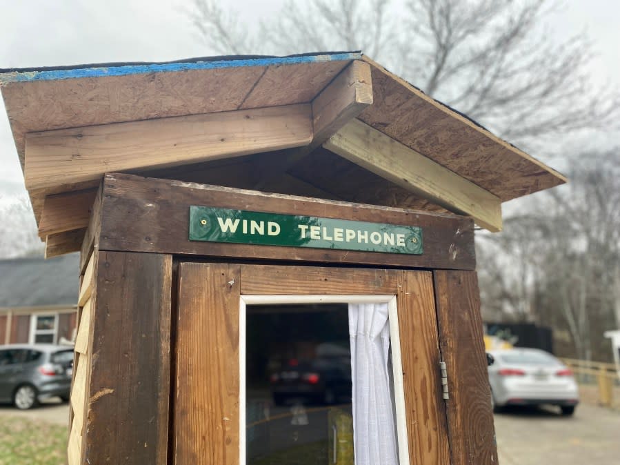 Nestled in a neighborhood in East Nashville is a phone booth that no longer rings but offers a bit of respite to those grieving a lost loved one. (WKRN)