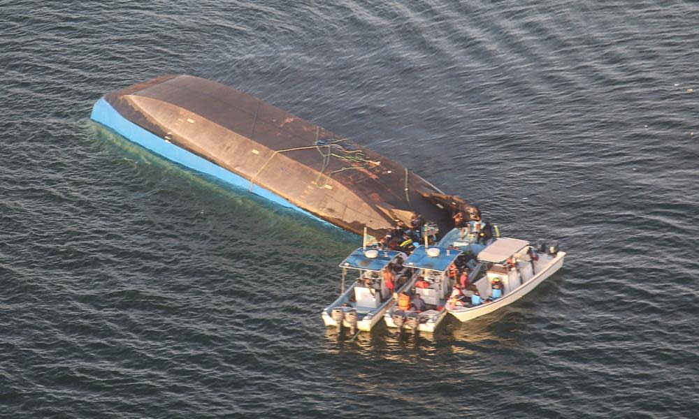 An aerial image shows the capsized ferry MV Nyerere