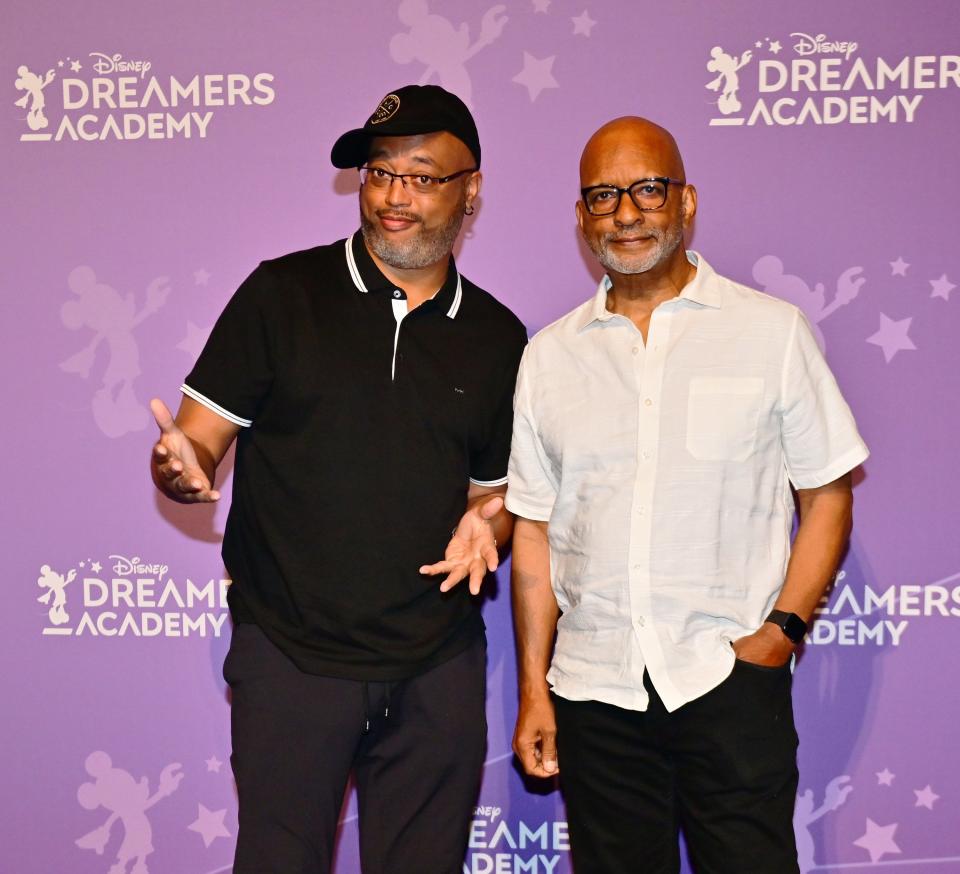 The Proud Family creators Bruce W. Smith and Ralph Farquhar pose during the 2022 Disney Dreamer's Academy at Walt Disney World Resort.