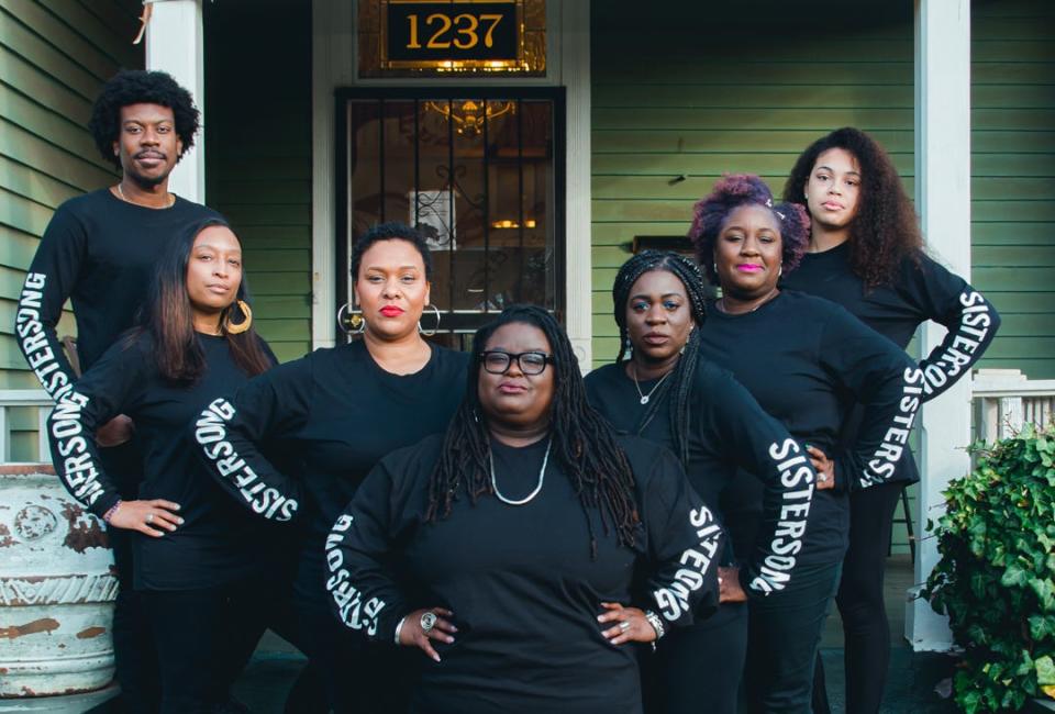 Monica Simpson, executive director of SisterSong, a multiracial reproductive justice organization, stands with her team. Simpson said, unlike the more mainstream phrase “reproductive rights,” the reproductive justice framework goes beyond abortion access.