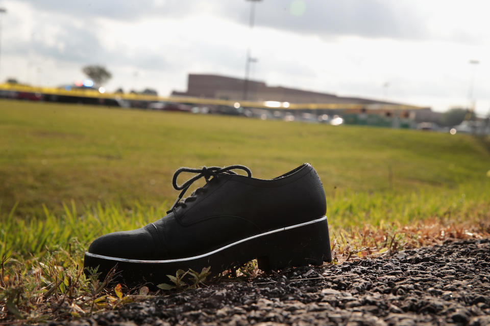 <p>A shoe sits along the road in front of Santa Fe High School on May 19, 2018 in Santa Fe, Texas. (Photo: Scott Olson/Getty Images) </p>