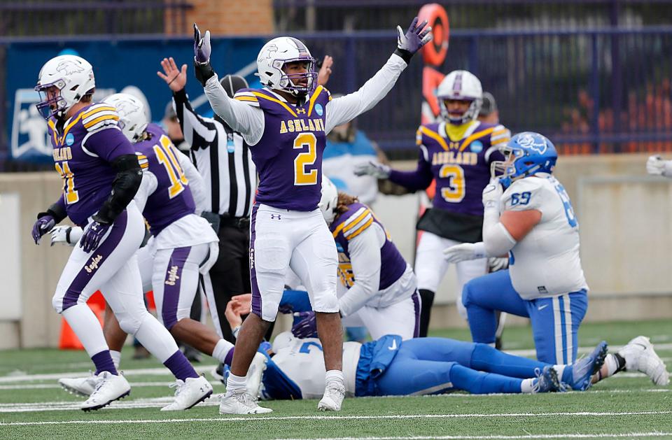 Ashland University's Jeffrey Barnett (2) celebrates after sacking Notre Dame College's Isaiah Murphy (7) on Notre Dame's final possession of the game late in the fourth quarter during their NCAA Division II college football playoff game at Jack Miler Stadium Saturday, Nov. 19, 2022. AU won the game 20-13 to advance to the second round of the NCAA playoffs. TOM E. PUSKAR/ASHLAND TIMES-GAZETTE