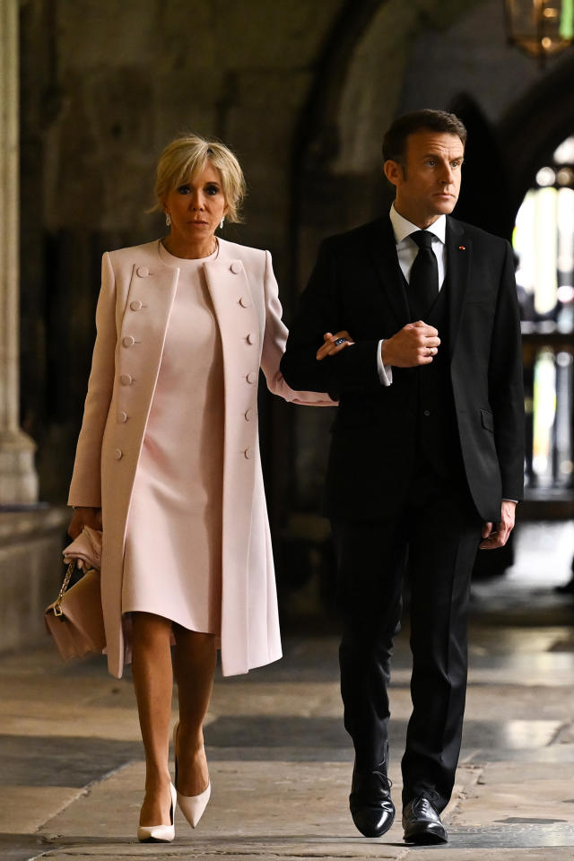LONDON, ENGLAND - MAY 06: French President Emmanuel Macron and his wife Brigitte Macron arrive to take their seats ahead of the Coronation of King Charles III and Queen Camilla on May 6, 2023 in London, England. The Coronation of Charles III and his wife, Camilla, as King and Queen of the United Kingdom of Great Britain and Northern Ireland, and the other Commonwealth realms takes place at Westminster Abbey today. Charles acceded to the throne on 8 September 2022, upon the death of his mother, Elizabeth II. (Photo by Ben Stansall - WPA Pool/Getty Images)