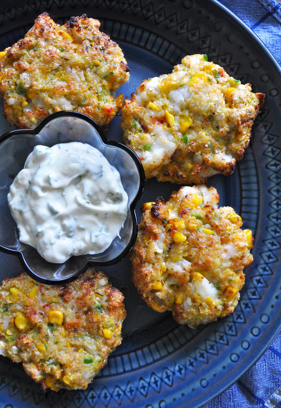 Shrimp cakes with dipping sauce.