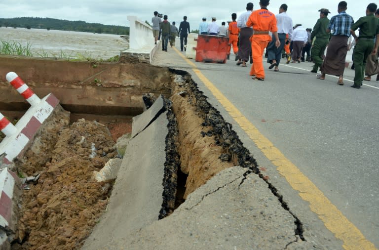 A section of a bridge damaged by rampaging flood waters